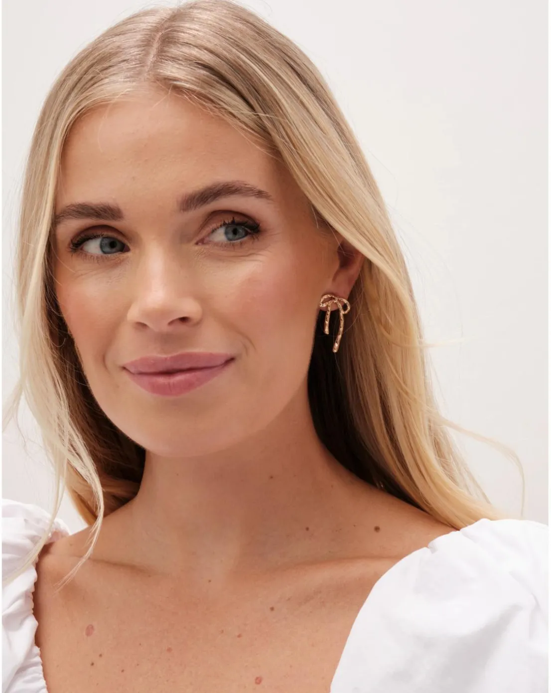 Mood Gold Hammered Polished Bow Earrings